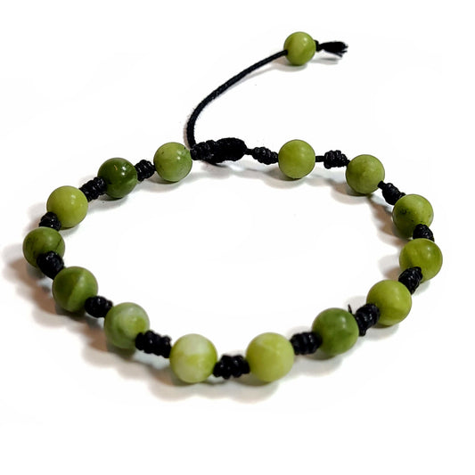 Handmade, hand knotted black cord, medium green matte finish aventurine beaded bracelet. Adjustable slip knot with one pull cord for adjusting the fit.