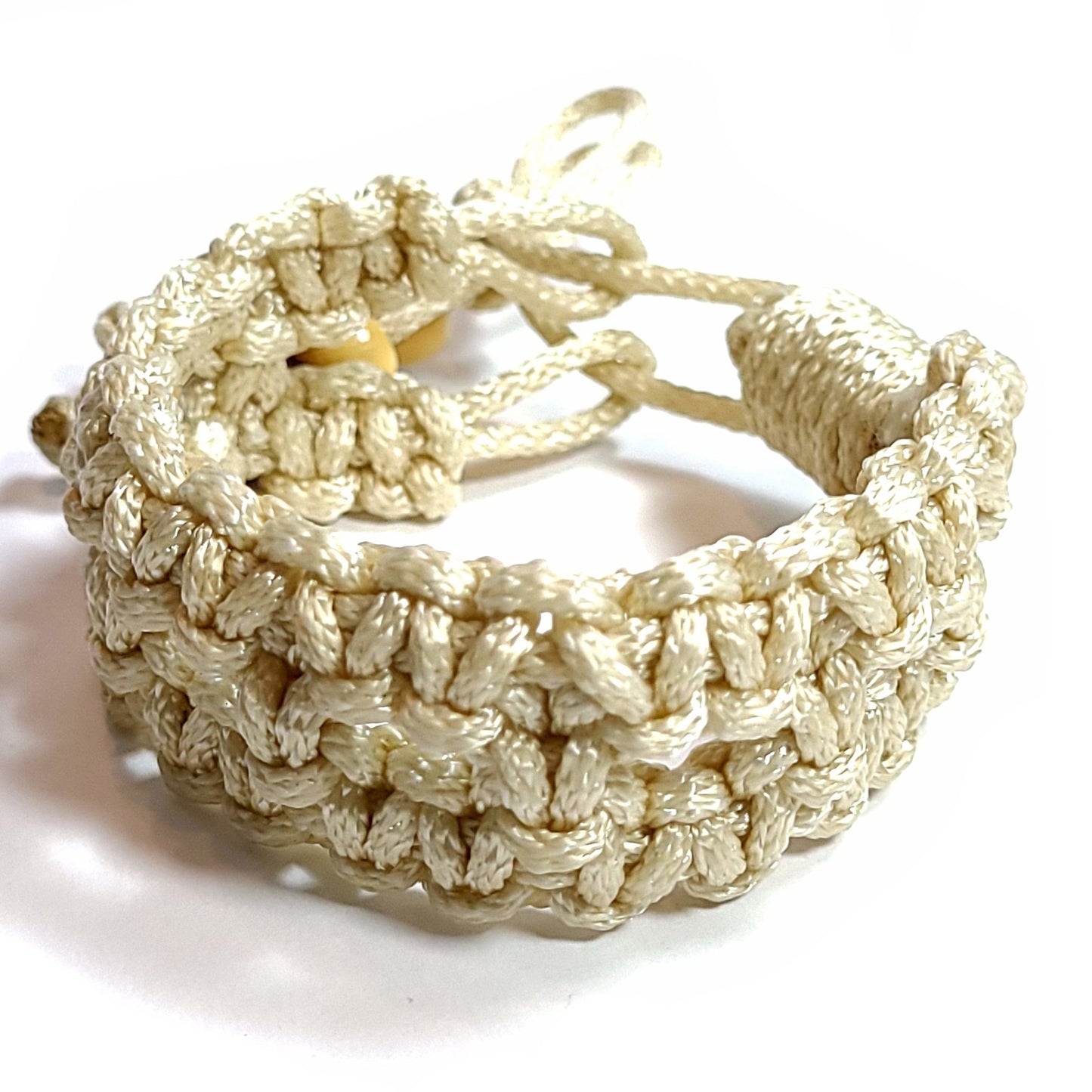 Macrame knotted bracelet/anklet with wooden bead tie ends.