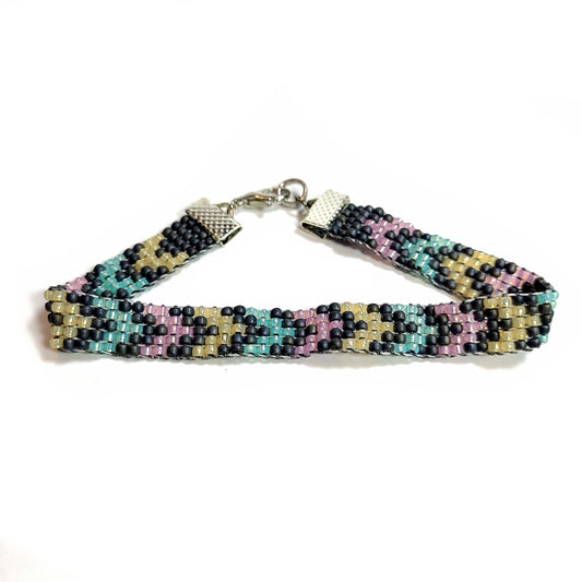 Chevron design woven bracelet. Translucent pink, and green seed beads, with medium gray matte finish beads.