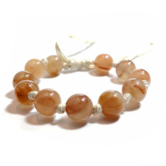 Milky beige, brown agate 10mm bead knotted adjustable bracelet. 