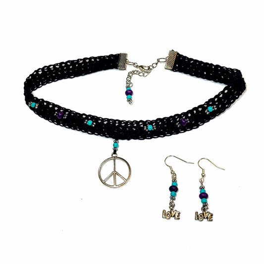 black choker with peace sign charm, dyed blue and purple beads and silver accent beads. It has an extender with a cute accent of the dyed blue and purple beads. Earrings have the same silver beads, and dyed blue and purple beads with love charms