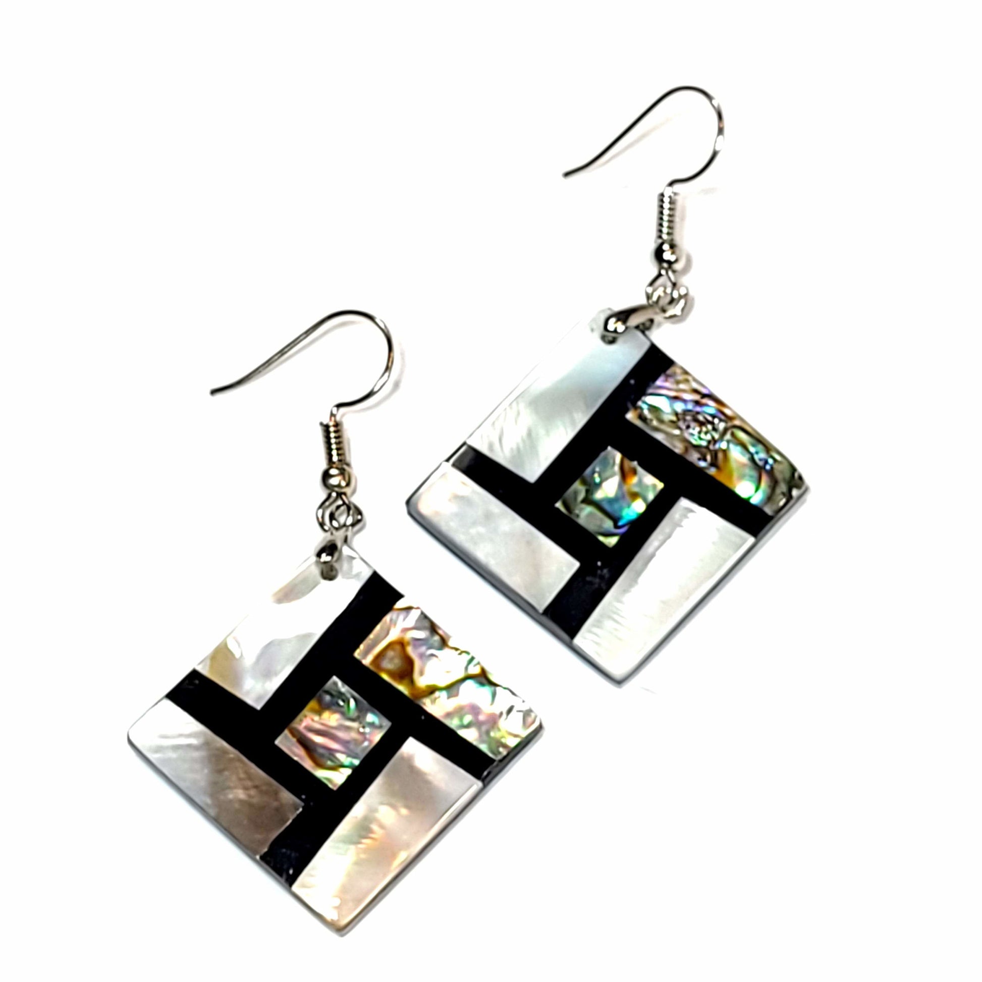 Earring set made of shell with black epoxy inlay.