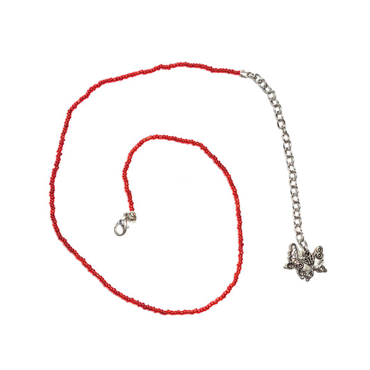 Single strand red seed bead necklace with an extender that has 2 butterfly charms on the end.