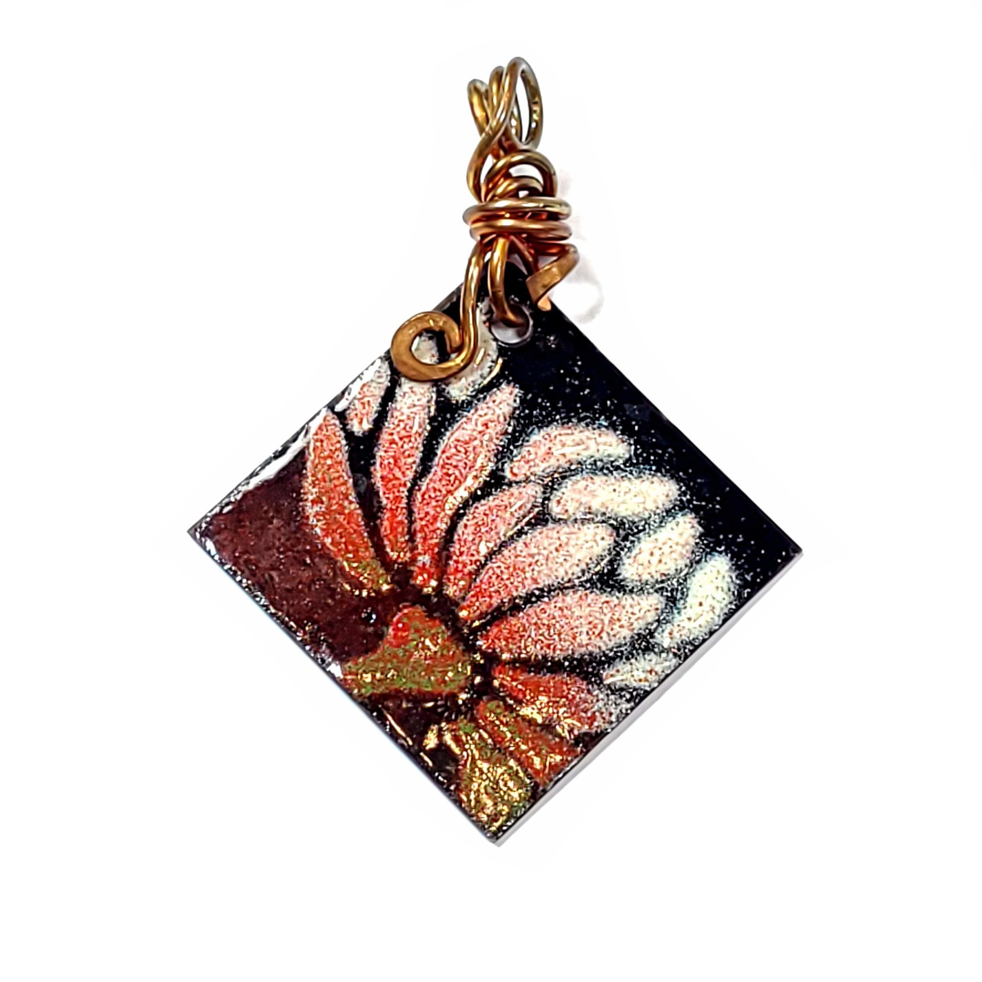 Flower Motiff on enamel pendant accented with copper wire.