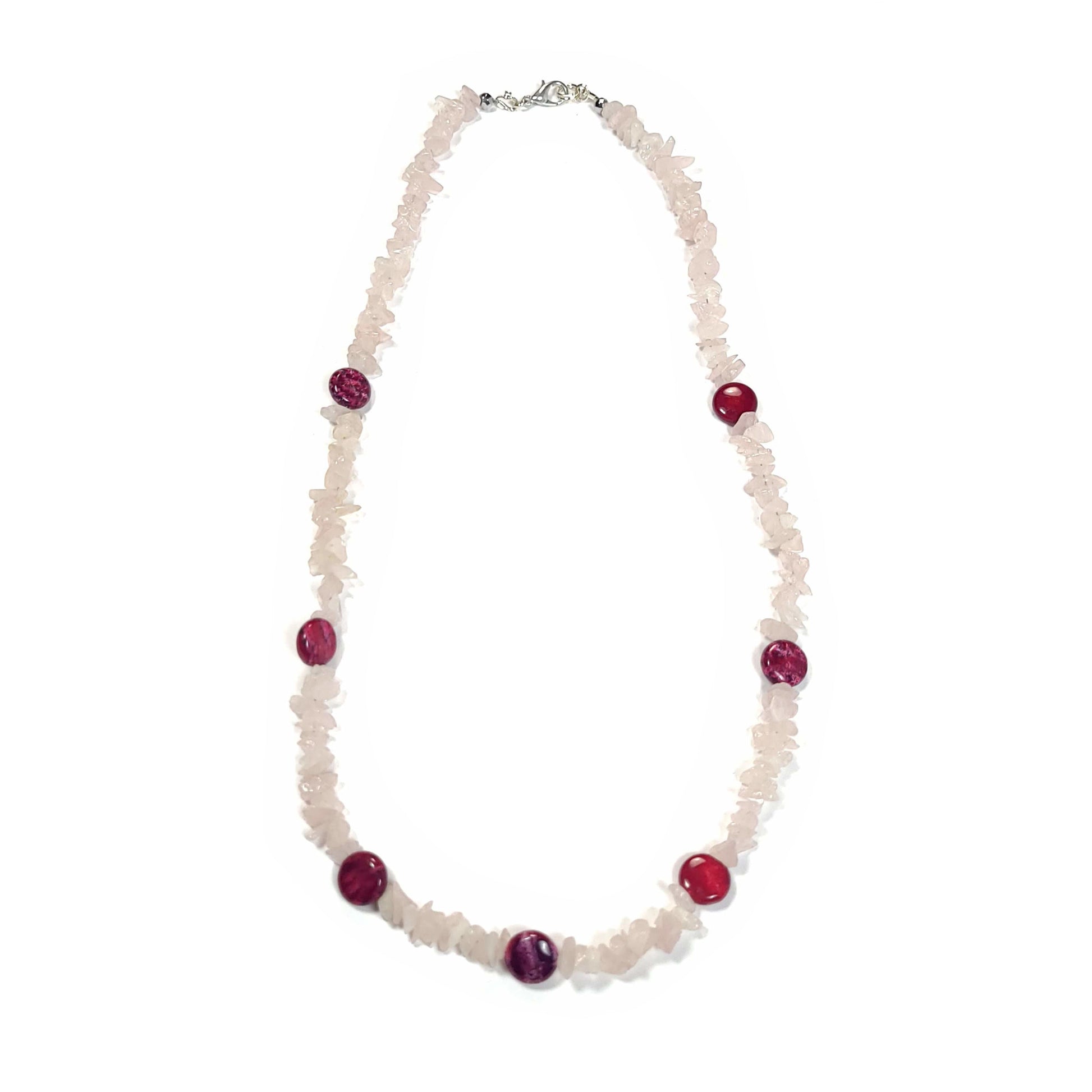 Necklace made of quartz chips and magenta agate disks with a silver toned lobster clasp and end beads.