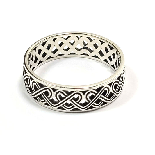 Silver band type ring with double line shaped into a celtic style continuous heart-knot type shape.